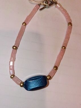 Delicate Pink Beaded Bracelet with Blue Accent
